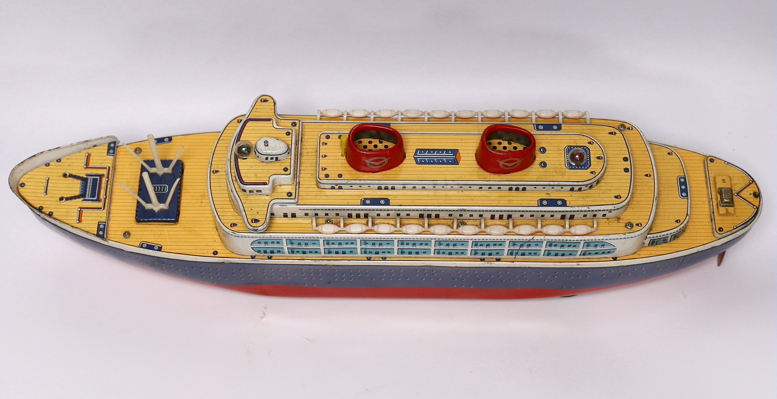 A boxed 1960s Modern Toys, Japan tinplate Queen of the Sea battery operated ocean liner, 54cm long